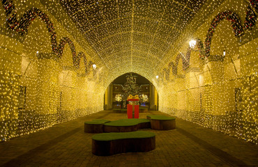MILAN, ITALY, DECEMBER 21, 2018 - View of a tunnel of lights in "Serravalle Outlet" shopping center on Chistmas time, near Milan, Italy.