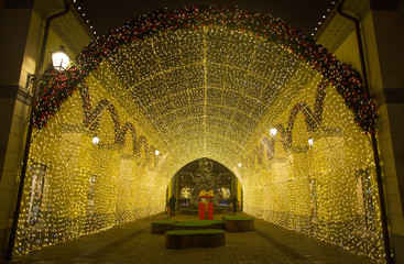 MILAN, ITALY, DECEMBER 21, 2018 - View of a tunnel of lights in "Serravalle Outlet" shopping center on Chistmas time, near Milan, Italy.