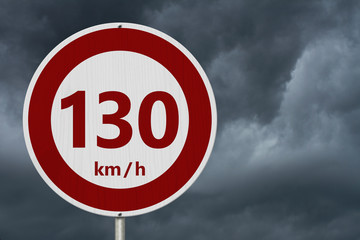 Red and white 130 km speed limit sign
