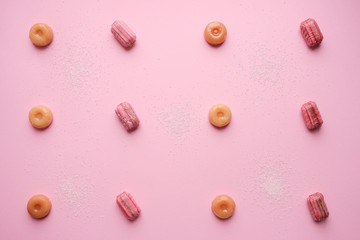 Pattern of caramel sweets. Candy pink background