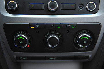 controls near the steering wheel in a modern car