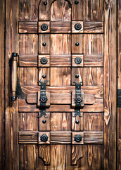.wooden doors with metal elements