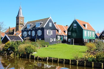 Fototapeta na wymiar Marken, Netherlands. Traditional colorful wooden houses of the typical fisherman village.