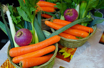 Fresh carrots for sale at a farmers market