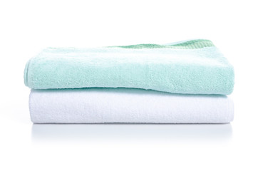 Stack towels white green on white background isolation