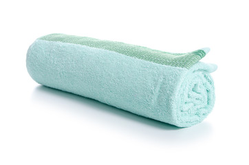 Green towel roll on white bckground isolation
