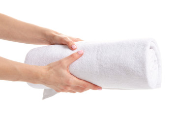 White towel roll in hand on white bckground isolation