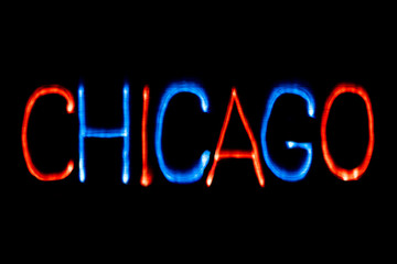 Light painting. City name. CHICAGO. Blue and red colors.