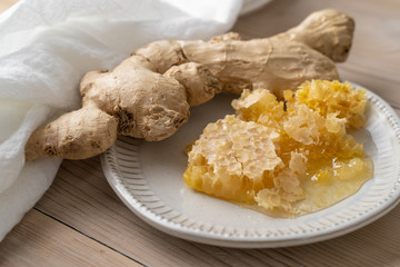 Fresh honeycomb and ginger used for making a therapeutic tea to help combat the flu and other illnesses. 