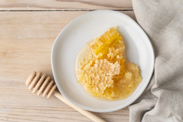 Fresh honeycomb and ginger used for making a therapeutic tea to help combat the flu and other illnesses. 