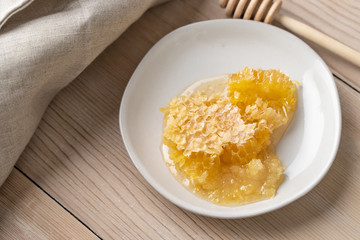 Fresh honeycomb and ginger used for making a therapeutic tea to help combat the flu and other illnesses. 