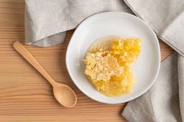 Fresh honeycomb and ginger used for making a therapeutic tea to help combat the flu and other illnesses. 