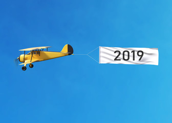 Flying airplane and Happy new year 2019 banner on blue sky