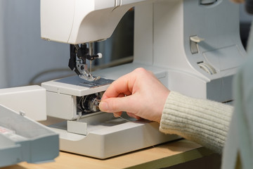 female tailor at work in the atelier