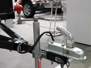 traction device - handle, wheel strut and the opened lock of the car trailer - towing, connection