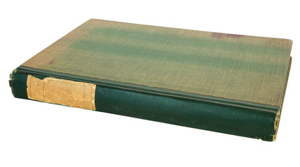 Weathered, stained and distressed vintage book with green cover. 