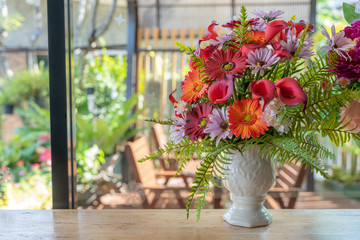 The flower vase is placed on the table.