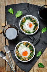Kale mushrooms baked egg with cups of coffee