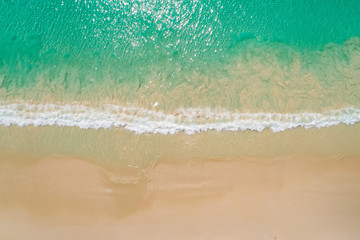 Fototapeta na wymiar Aerial top view beautiful sea landscape, beach and wave with turquoise sea water with copy space