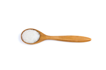 top view sugar in a wooden spoon