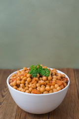 Cooked Chickpeas. Healthy food nutritious food. Vegetarian food over wooden board.