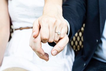 Obraz premium A newly engaged couple showing off the ring.