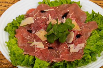 Beef carpaccio with parmesan cheese