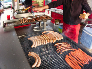 Grill frying fresh meat barbecue sausages, BBQ picnic sandwich store