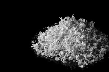 wood shavings on black glass with reflection. Can be used as background