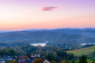 Obraz premium Polanczyk, Bieszczady Mountains, Poland: Sun rising over Solina Lake. Views from near hill.