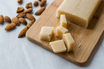 Fototapeta premium Homemade Almond Paste Whole Marzipan on Wooden Board.