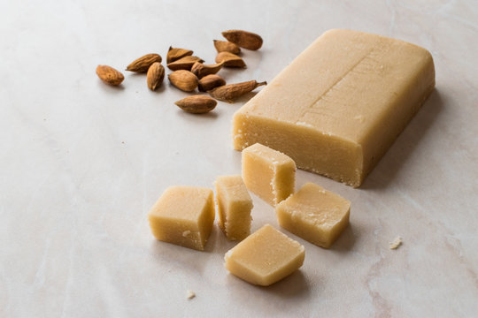 Homemade Almond Paste Whole Marzipan on Wooden Board.