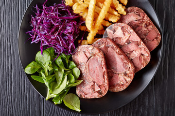 beef tongue aspic with coleslaw and french fries
