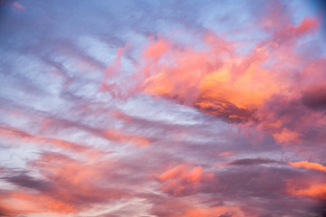 Fototapeta na wymiar Clouds orange blue and violet color sunset sky background