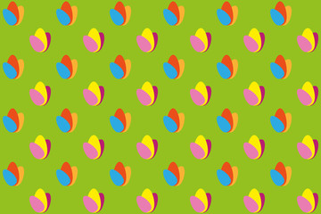 seamless background of easter eggs on green