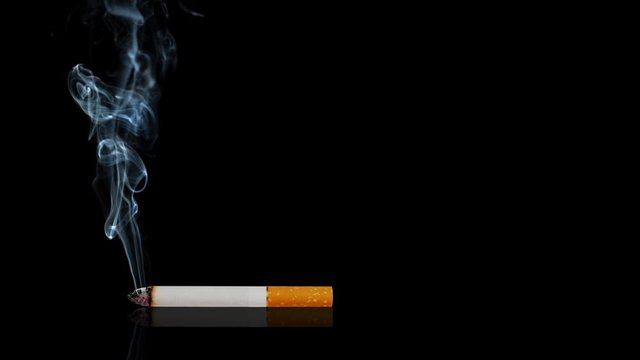 Smoke of Death features a cigarette laying on a black reflective surface with smoke slowly rising from the tip of the cigarette