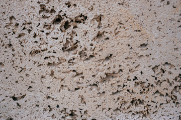 Natural beige stone texture. Textured background of a stone.