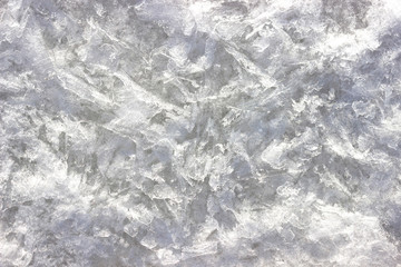abstract texture of snow and crushed thin ice of bright white color. frosty pattern