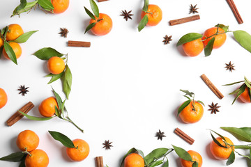 Christmas composition with ripe tangerines and space for text on white background, flat lay