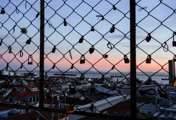 Lisbon - Portugal, couples of lovers leave a lock on the Santa Justa elevator