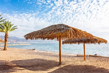 Eilat sand beach over Red Sea.