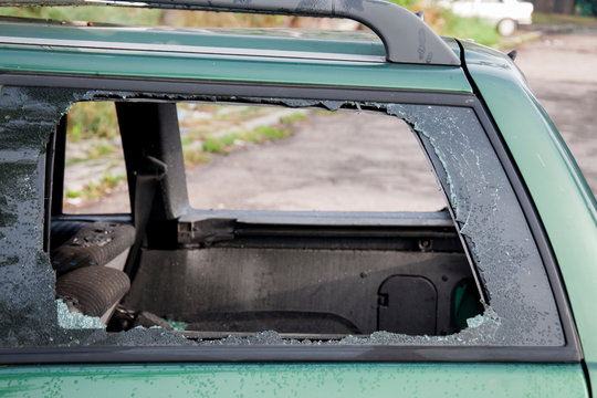 Broken car window. A criminal incident. - Image
