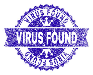 VIRUS FOUND rosette stamp seal overlay with grunge texture. Designed with round rosette, ribbon and small crowns. Blue vector rubber print of VIRUS FOUND title with grunge texture.