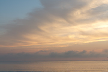 Fototapeta premium Clear bright blue sky with sunny clouds - perfect for background. Blue, white pastel heaven in soft focus. Simple shot of peaceful and beautiful nature. Opened, minimalist view out of windows. - Image