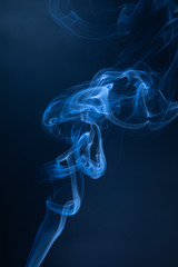 Abstract blue smoke swirls