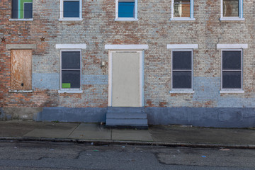 Obraz na płótnie Canvas Front of vintage apartment building in urban area