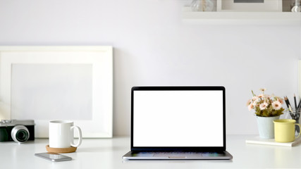 Fototapeta premium Minimal workplace with mockup blank screen tablet