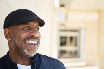 Portrait of an African American sitting outside.