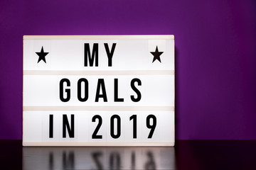 My goals 2019 sign - cinema style lettering on light box & purple background