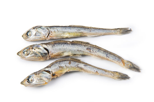 Dried anchovies used in Korean cuisine. Isolated on white background.